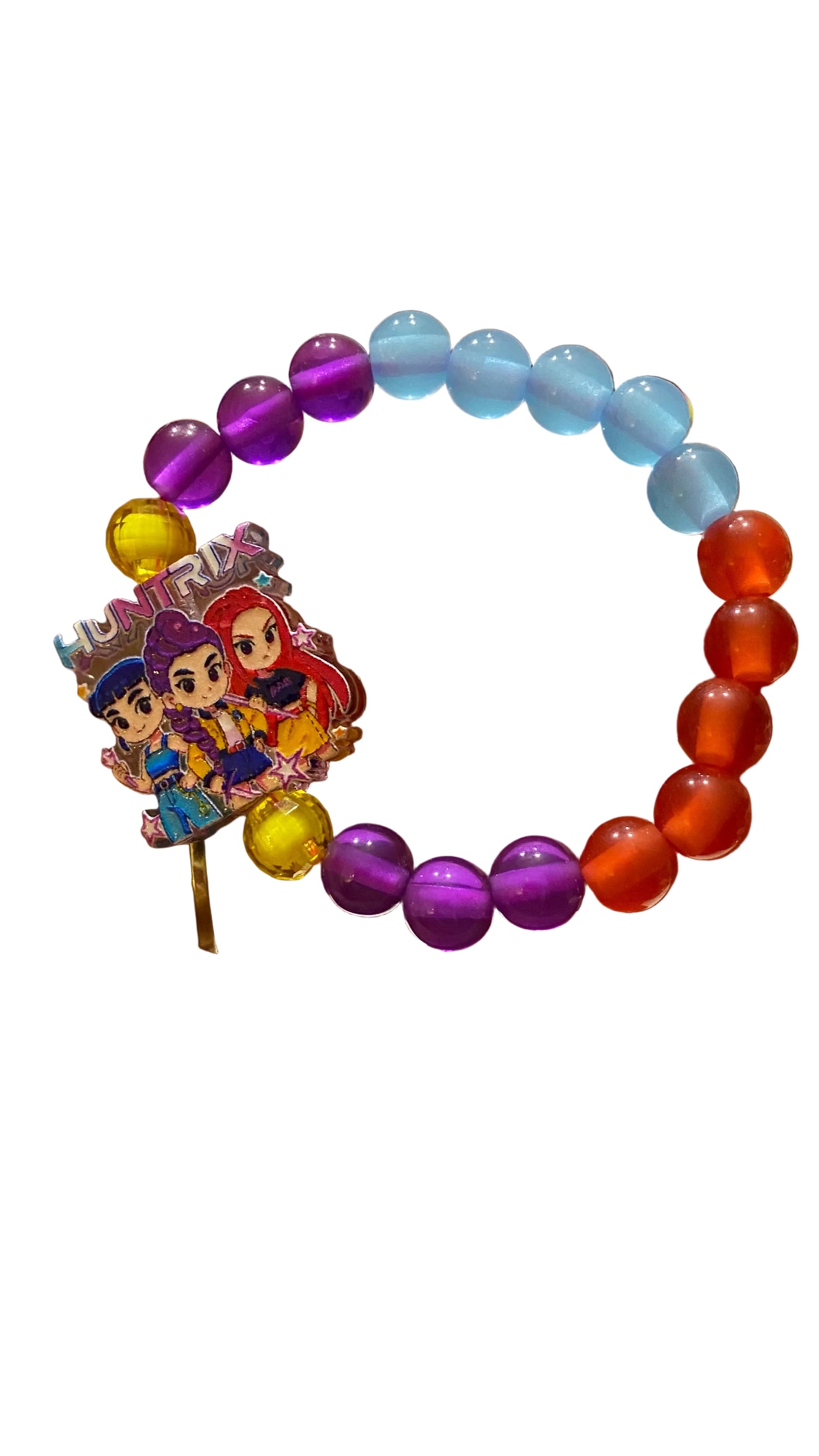 Colorful beaded bracelet with cartoon character charm held in a hand.